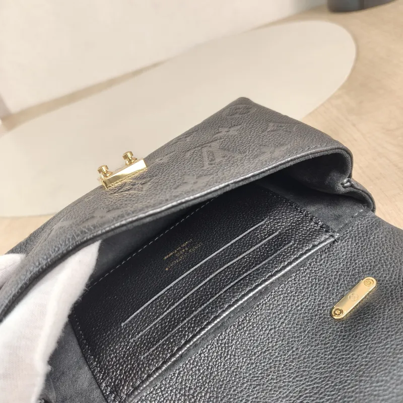 Louis Vuitton Crossbody Bag MADELEINE Black Monogram Empreinte Embossed Calfskin nano 21 × 6 × 12.5 cm — detail view 11 of 12