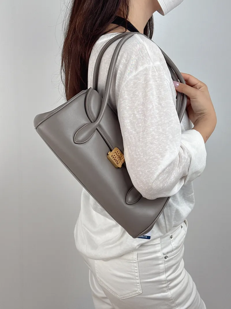 Miumiu Shoulder Bag Grey Calfskin One Size 27.5 × 10 × 14 cm — on-model view 2 of 2