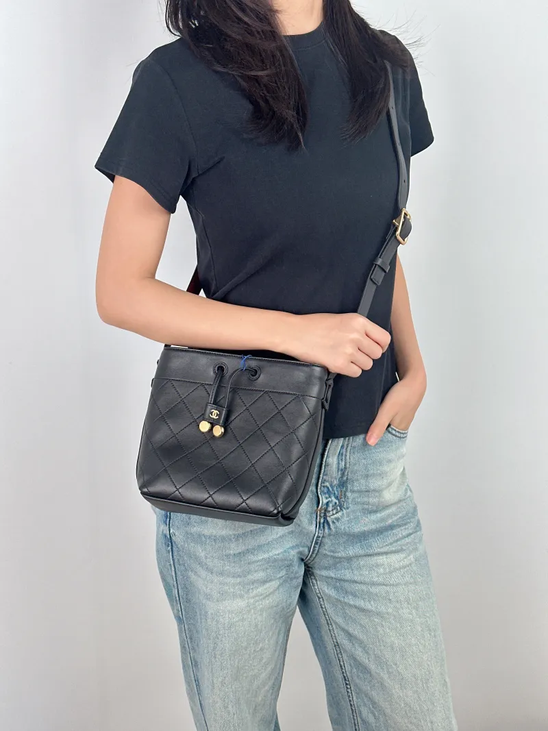 Chanel Shoulder Bag Bucket Bag Black Lambskin Mini 16 × 10 × 18 cm — on-model view 2 of 2