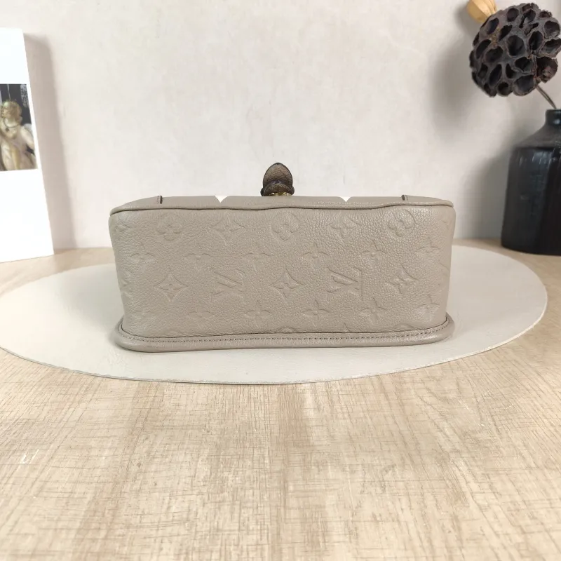 Louis Vuitton Crossbody Bag Diane Baguette Bag Monogram Empreinte Embossed Calfskin Small 24 × 9 × 15 cm — cover view 5 of 5