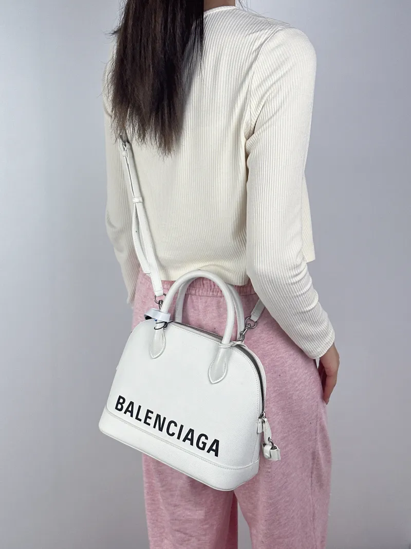 BALENCIAGA Top Handle Bag Ville Dome Bag White Calfskin Small26 × 11 × 22 cm — on-model view 1 of 3
