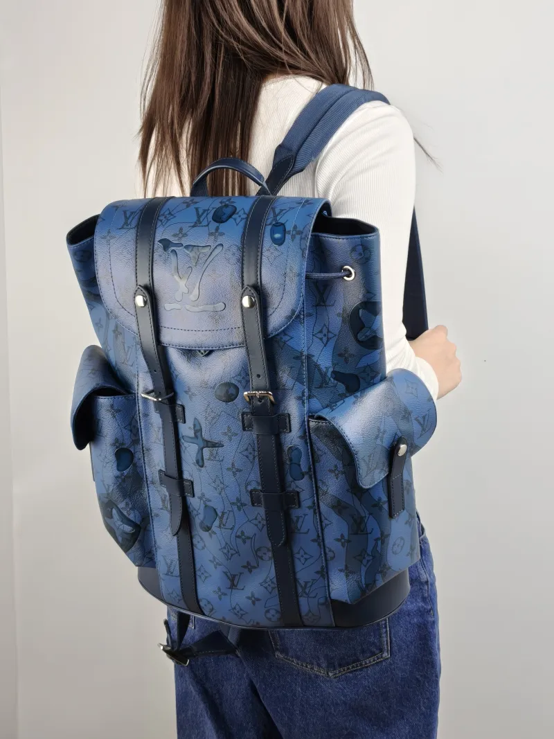 Louis Vuitton Backpack Christophe Backpack Blue PVC 33 × 12 × 44 cm — on-model view 1 of 2