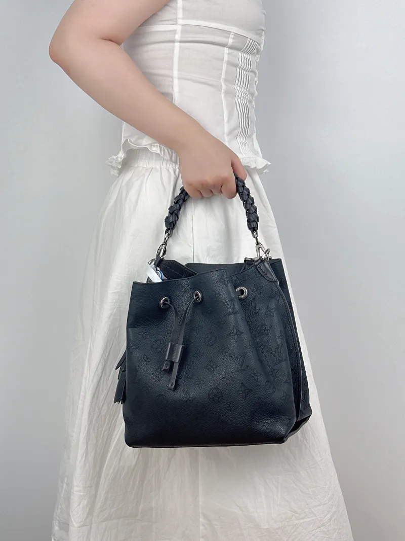 Louis Vuitton Shoulder Bag Muria Black Calfskin One Size26 × 14 × 26 cm — on-model view 2 of 3