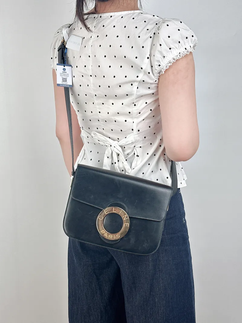 CELINE Crossbody Bag Crossbody Bag Black Calfskin One Size24 × 5 × 18 cm — on-model view 1 of 2