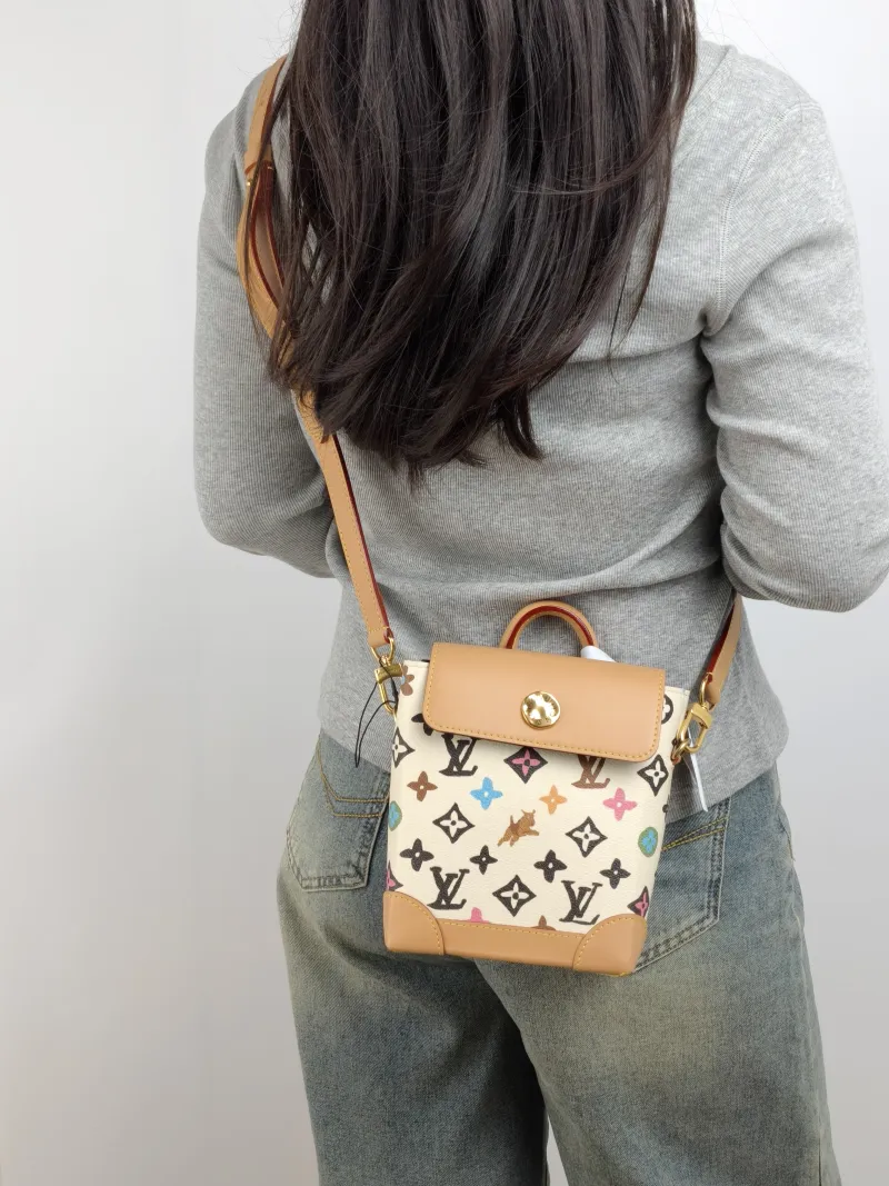 Louis Vuitton Crossbody Bag Nano Steamer Shoulder Bag Tyler Yellow PVC nano 15 × 7 × 18 cm — on-model view 2 of 2
