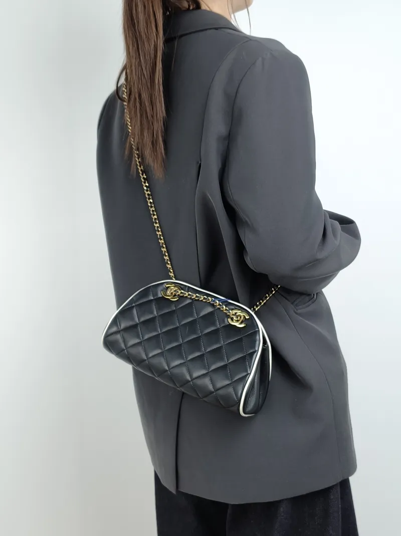 Chanel Crossbody Bag Bowling Bag Black Lambskin One Size 25 × 8 × 14 cm — on-model view 2 of 2