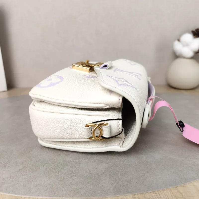 Louis Vuitton Crossbody Bag Pochette Métis East West White · Monogram Empreinte Embossed Calfskin Small 21.5 × 6 × 13.5 cm — detail view 11 of 14