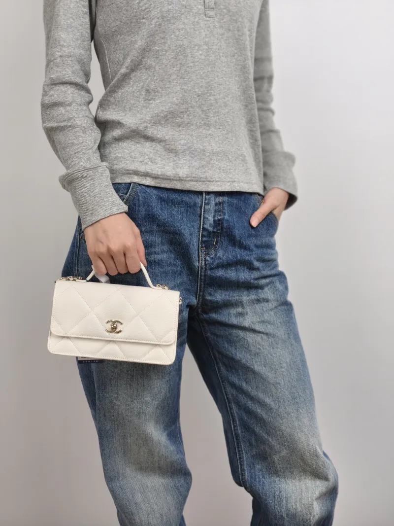Chanel Crossbody Bag woc White Grained Calfskin 19.2 × 6 × 10.5 cm — on-model view 1 of 3