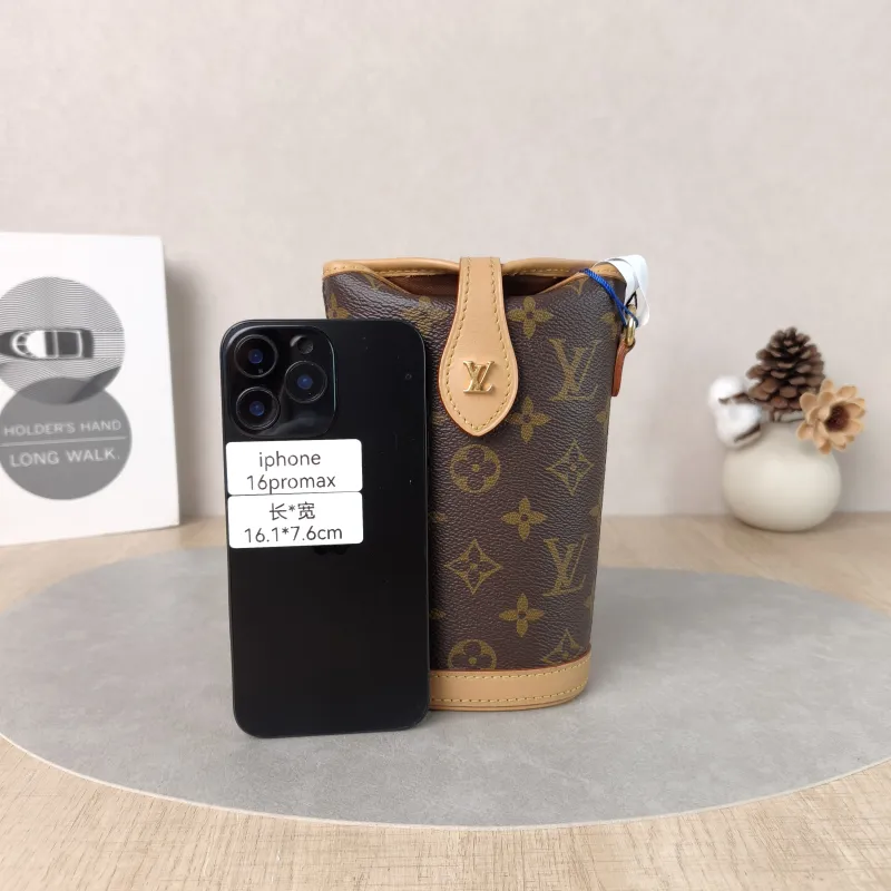 Louis Vuitton Crossbody Bag Fold Me Monogram PV Cmini14.5 × 6.5 × 18 cm — cover view 3 of 5