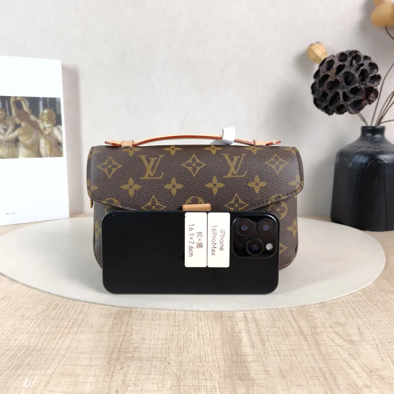 Louis Vuitton Crossbody Bag Pochette Métis East West Monogram PVC Small 21.5 × 6 × 13.5 cm — cover view 2 of 5