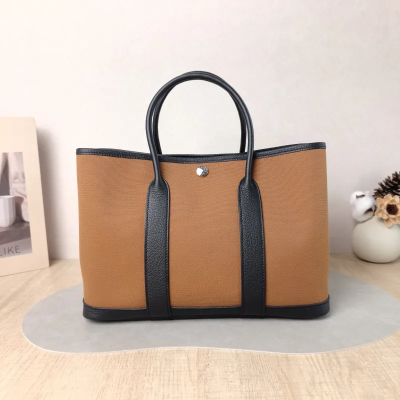 Hermès Top Handle Bag Garden Party 30 30 Brown Canvas · Negonda Calfskin Medium 30 × 13 × 21 cm B