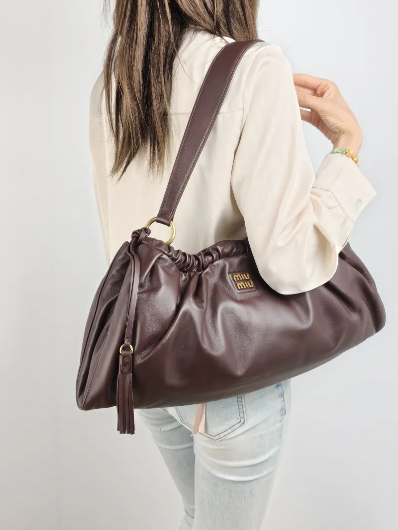 Miumiu Shoulder Bag Joie Shoulder Bag Lambskin Large 52 × 8 × 23 cm — on-model view 2 of 2