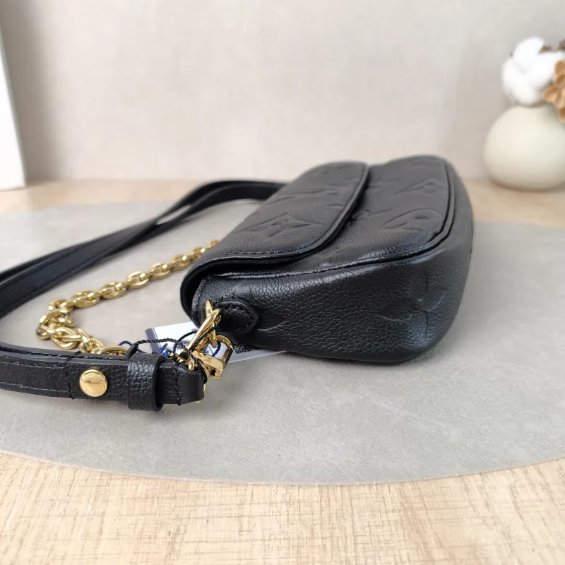 Louis Vuitton Crossbody Bag IVY Black Empreinte Embossed Calfskin Small 23.5 × 4.3 × 12 cm — detail view 1 of 13