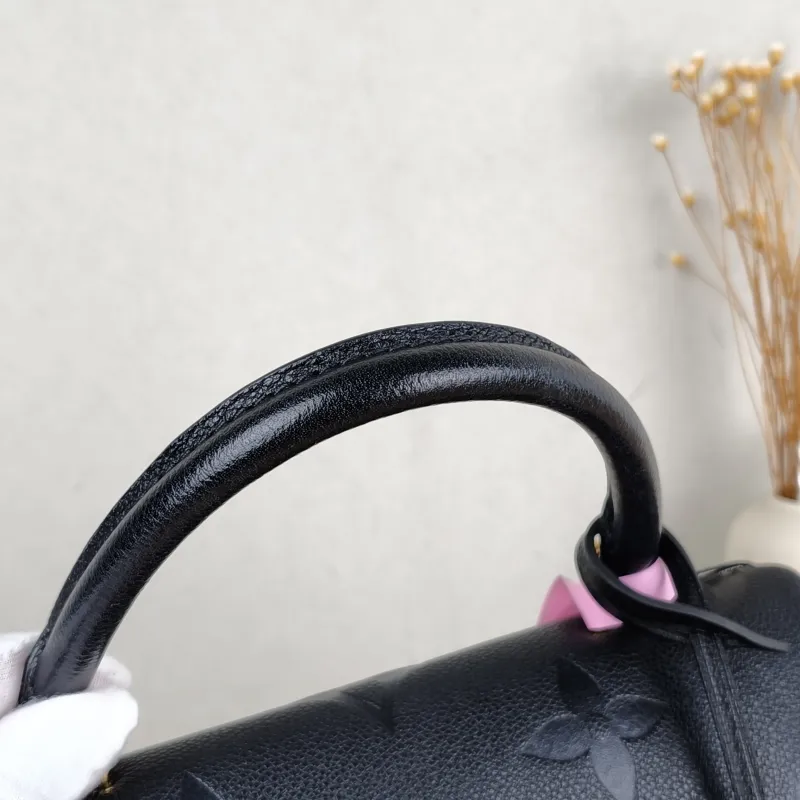 Louis Vuitton Crossbody Bag MADELEINE Black Monogram Empreinte Embossed Calfskin Medium 30 × 11 × 19.5 cm — detail view 2 of 13
