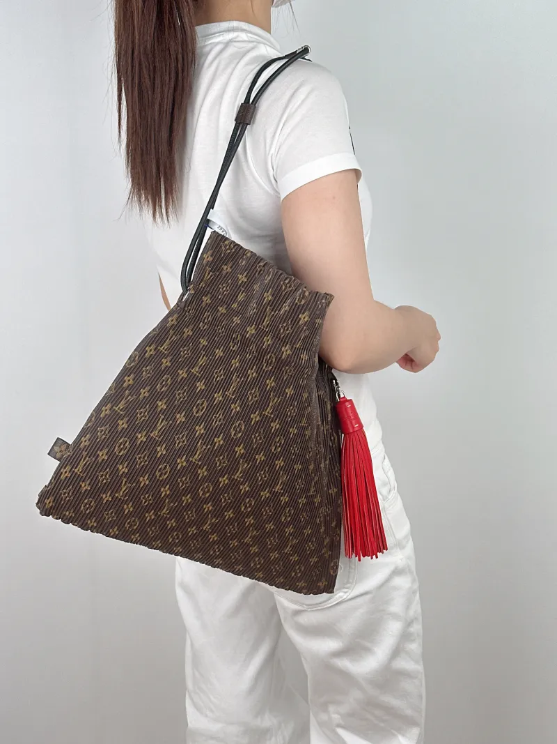 Louis Vuitton Shoulder Bag Shoulder Bag Monogram PVC One Size37 × 4 × 37 cm — on-model view 2 of 2