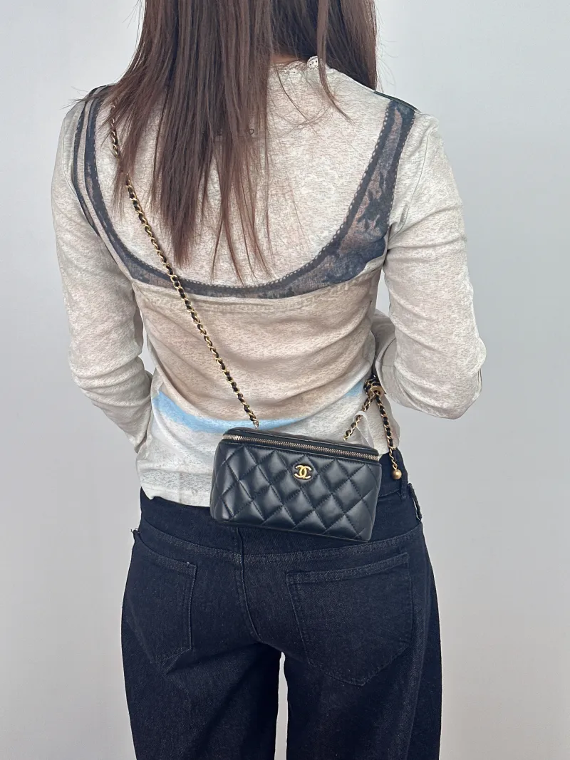 Chanel Crossbody Bag Edition Box Bag Cosmetic Bag Black Lambskin 17 × 8 × 9.5 cm — on-model view 1 of 2