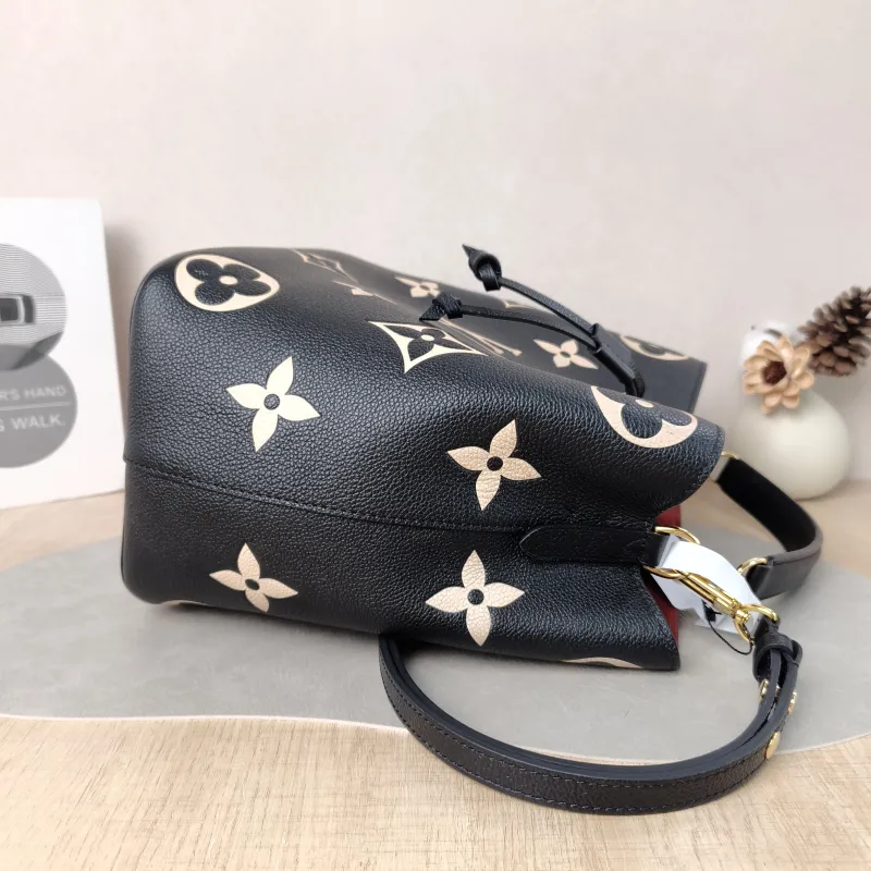 Louis Vuitton Shoulder Bag NÉONOÉ Bucket Bag Black · White Monogram Empreinte Embossed Calfskin Medium 26 × 17.5 × 26 cm — detail view 11 of 14