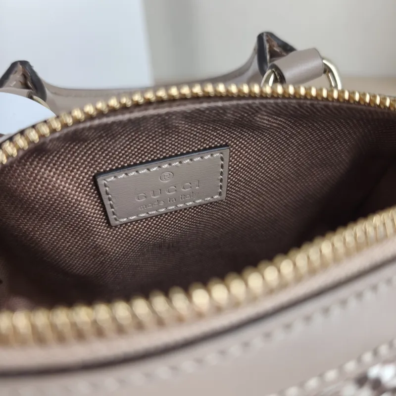 GUCCI Crossbody Bag GG Emblem Crossbody Bag nano 16.5 × 8 × 10 cm — detail view 1 of 9