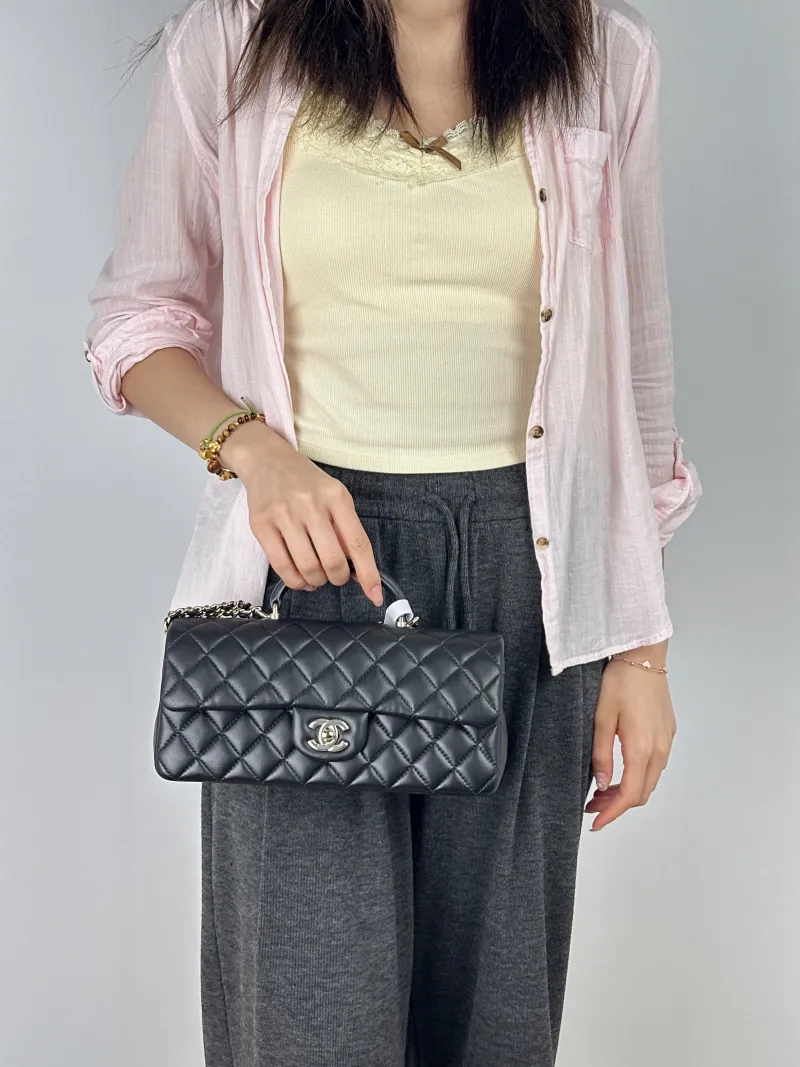 Chanel Crossbody Bag CF Crossbody Bag Black Lambskin Medium25.5 × 6 × 12.5 cm — on-model view 1 of 2