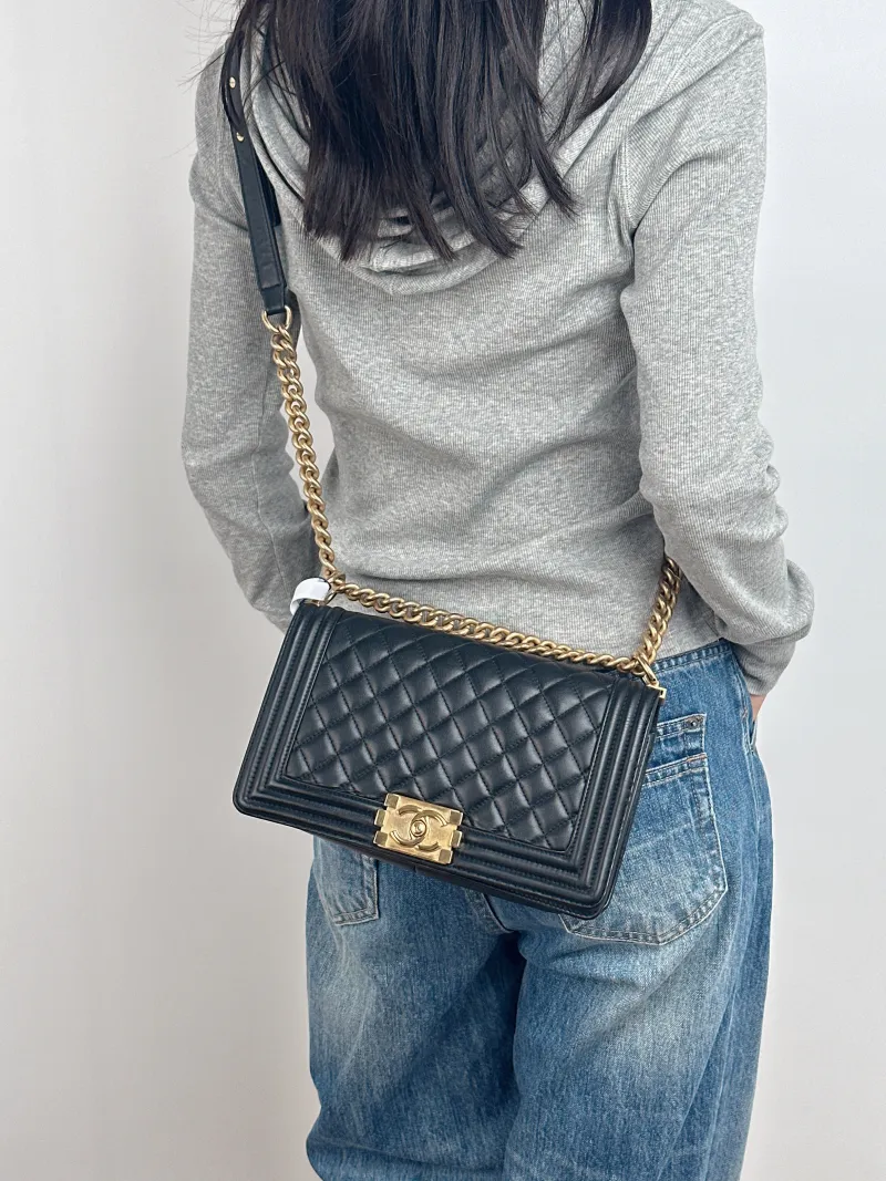 Chanel Crossbody Bag Le Boy​ Black Medium 25 × 9 × 15 cm — on-model view 1 of 3