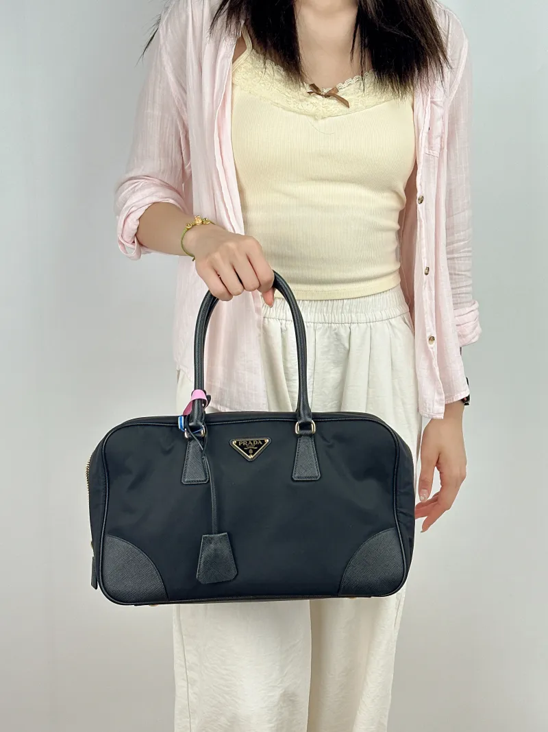 PRADA Top Handle Bag Black Nylon One Size 35 × 9 × 21 cm — on-model view 1 of 2
