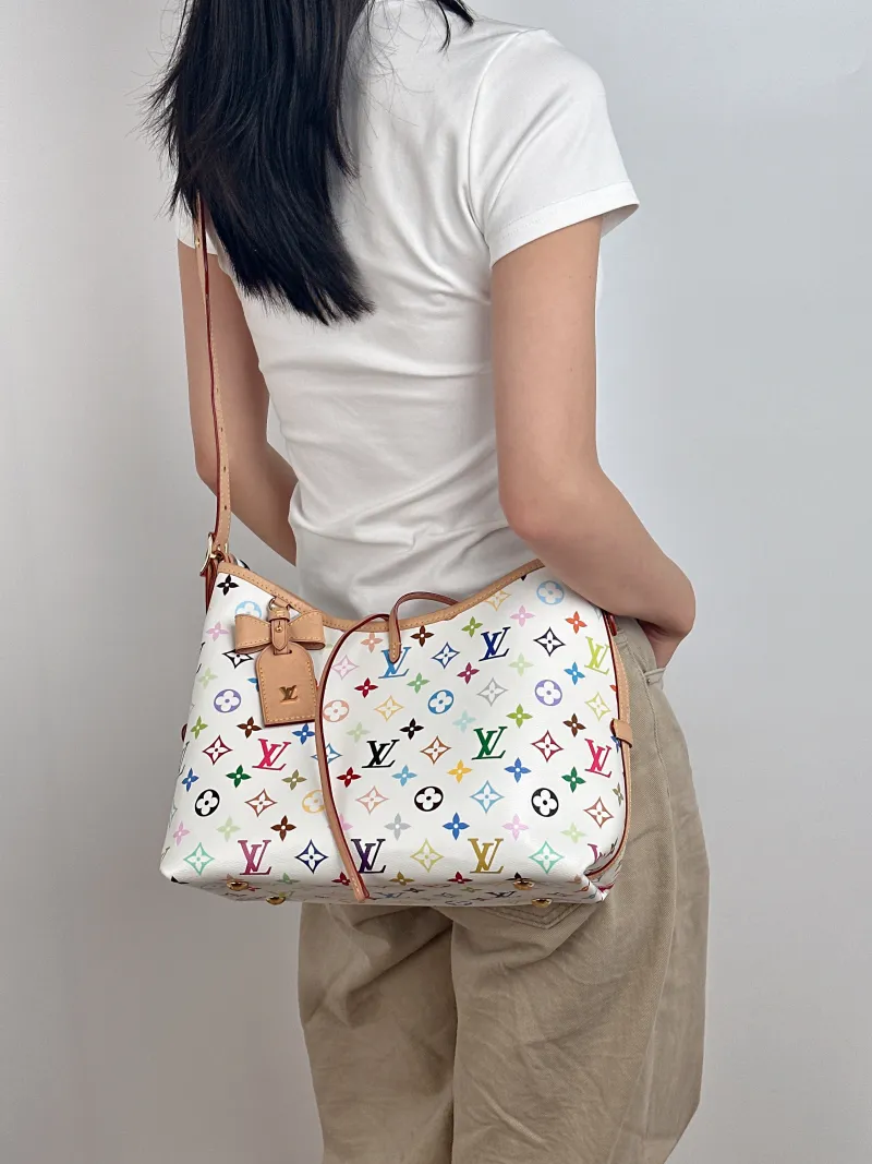 Louis Vuitton Crossbody Bag Carryall Multicolore PVC Small 29 × 12 × 24 cm — on-model view 1 of 2