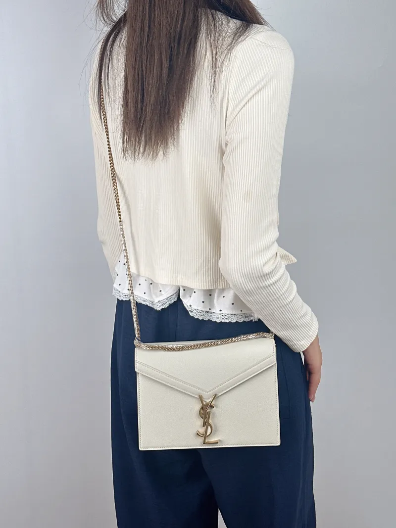 SAINT LAURENT Crossbody Bag Cassandra White Grained Calfskin Medium 22 × 5.5 × 16.5 cm — on-model view 2 of 2