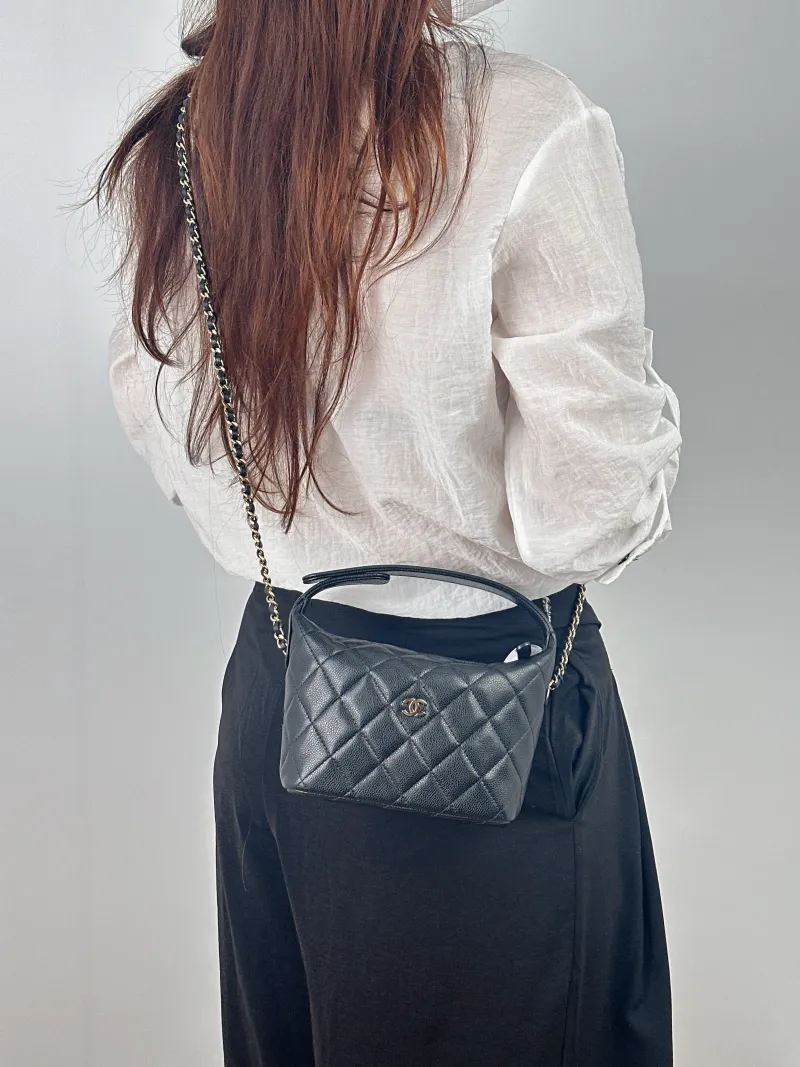 Chanel Crossbody Bag Crossbody Bag Black Grained Calfskin 21.5 × 7.5 × 19 cm — on-model view 2 of 2