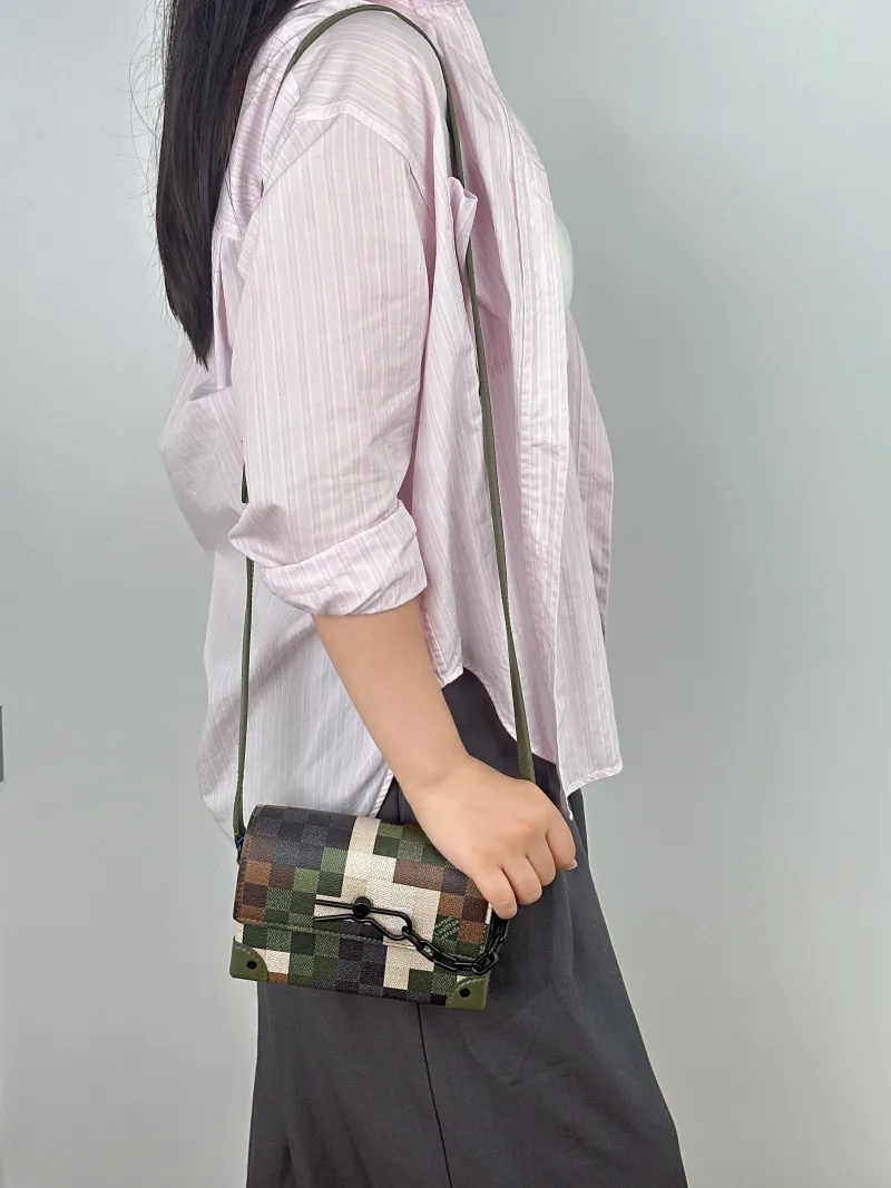 Louis Vuitton Crossbody Bag Steamer Box Green PVC Mini 18 × 6.5 × 11 cm — on-model view 1 of 2