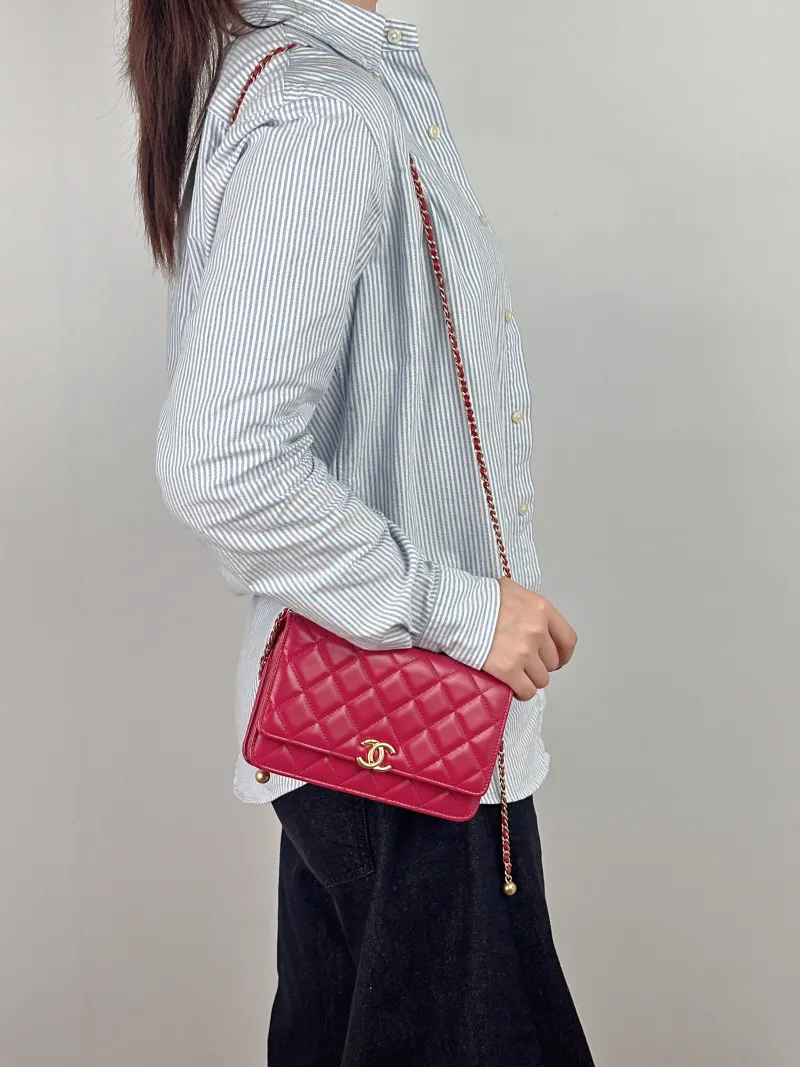 Chanel Crossbody Bag woc Red Calfskin One Size 19.2 × 3.5 × 12.3 cm — on-model view 2 of 2