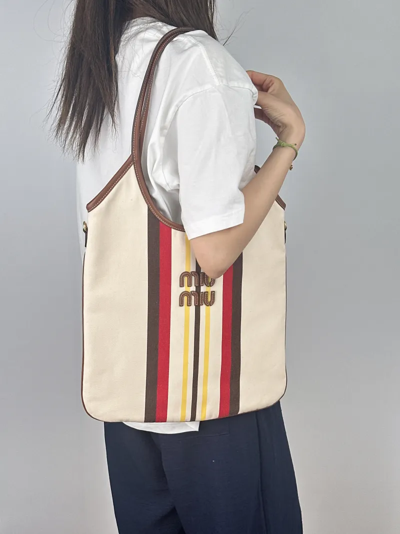 Miumiu Shoulder Bag IVY Tote Shopping Tote Canvas Medium35*40 — on-model view 2 of 2