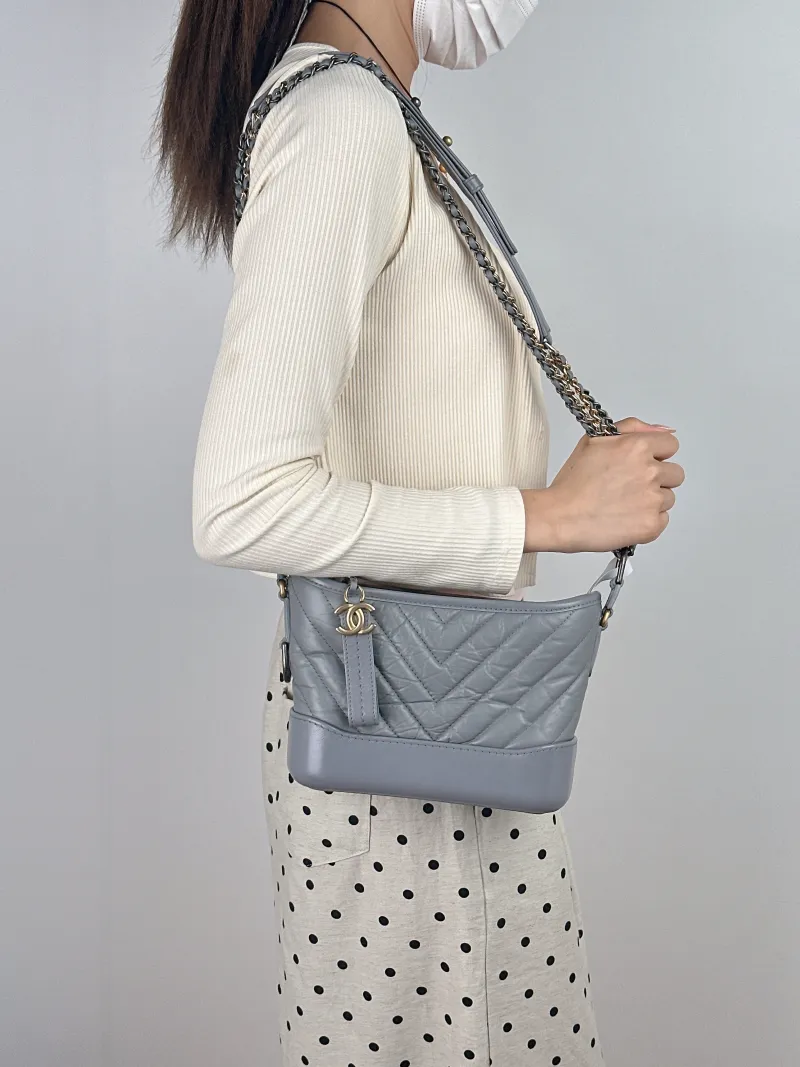 Chanel Crossbody Bag v Gabrielle Gabrielle Bag Grey Calfskin Small 20 × 8 × 15 cm 28 — on-model view 1 of 2