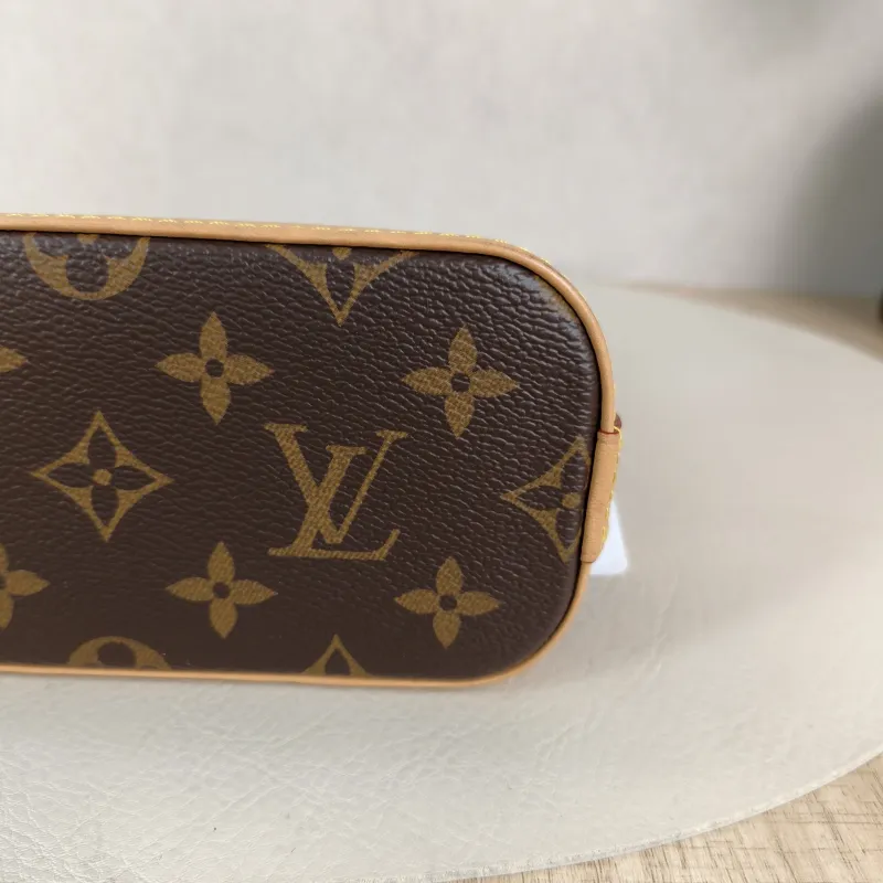 Louis Vuitton Crossbody Bag Alma Nano Monogram PVC nano 18 × 8 × 12 cm — detail view 12 of 12