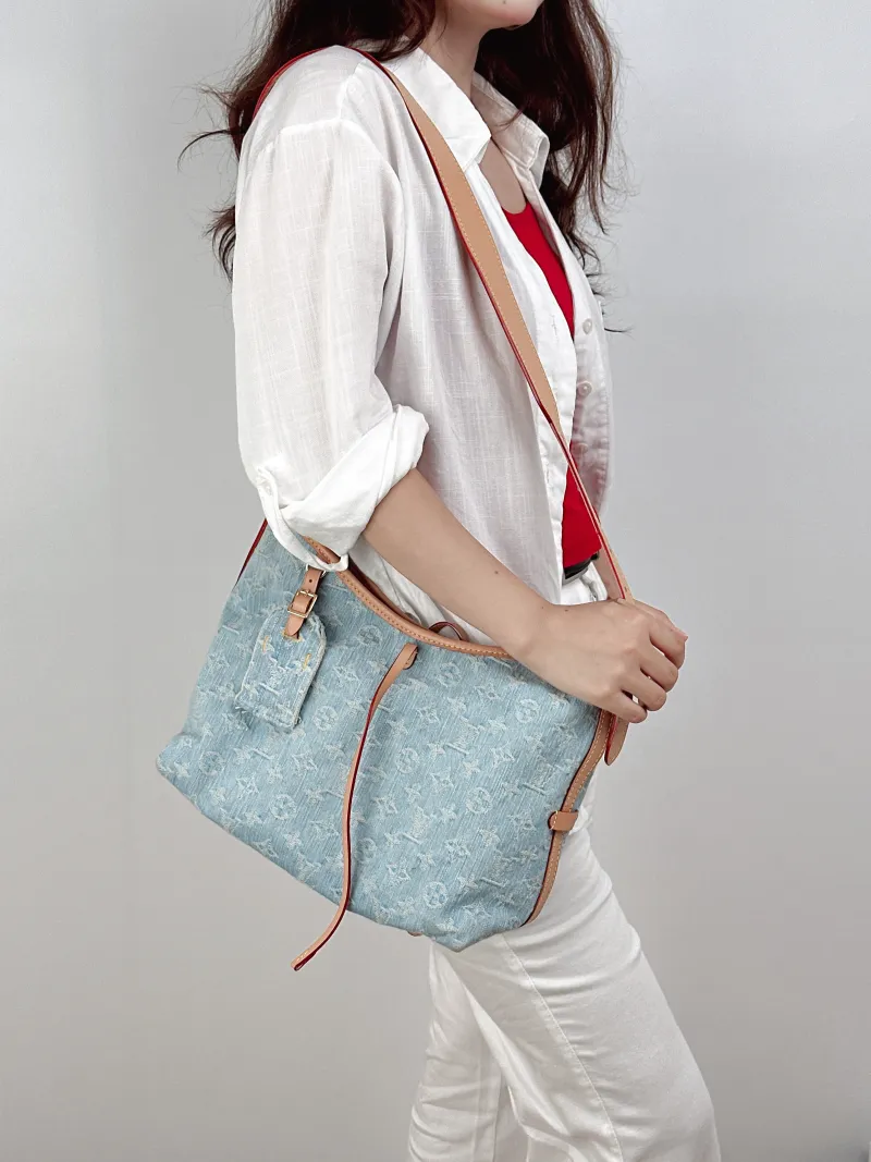 Louis Vuitton Crossbody Bag Carryall Blue Small29 × 12 × 24 cm — on-model view 2 of 2
