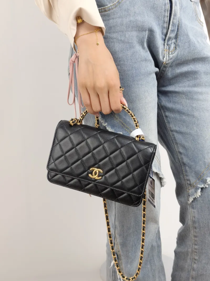 Chanel Crossbody Bag woc Black Lambskin Mini 19.2 × 3.5 × 12.3 cm — on-model view 3 of 3