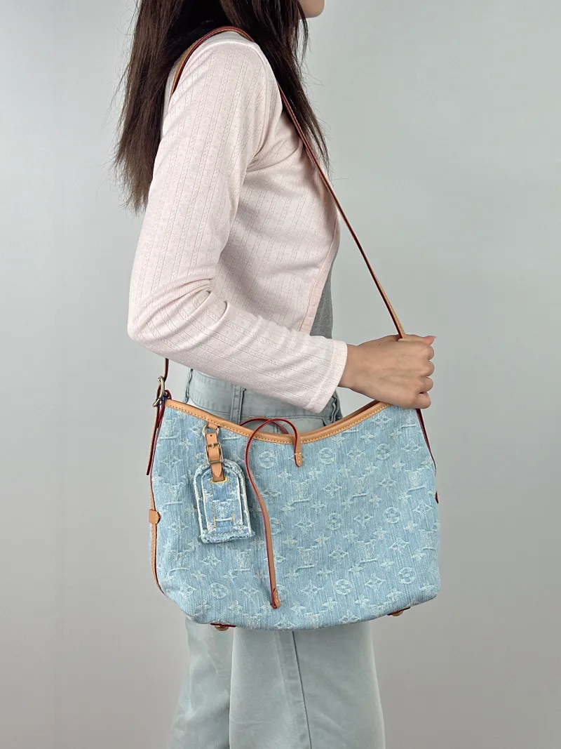 Louis Vuitton Crossbody Bag Carryall Blue Small 29 × 12 × 24 cm — on-model view 2 of 2