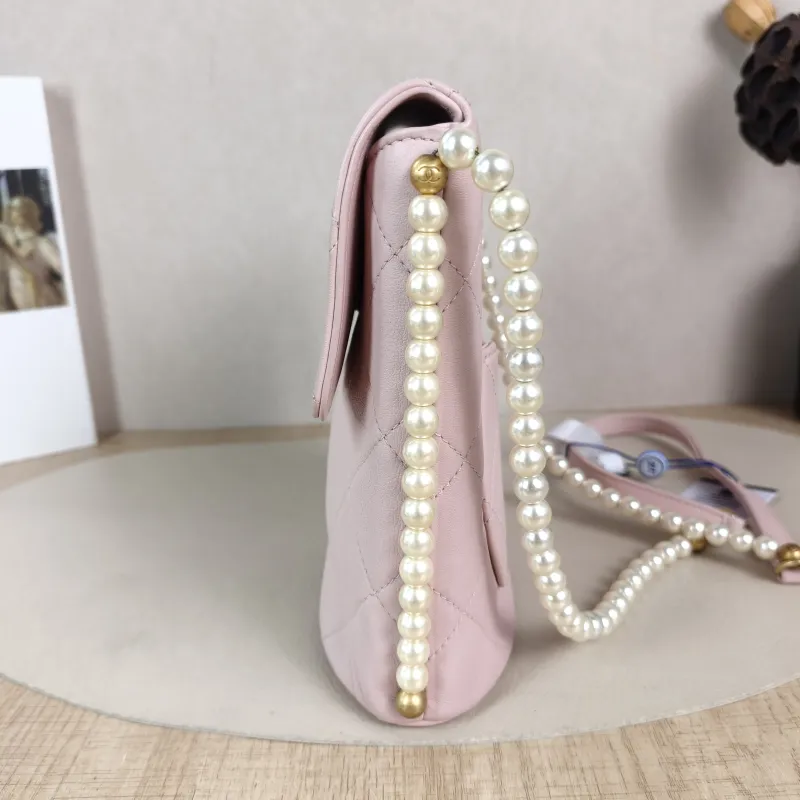Chanel Crossbody Bag Pearl Crossbody Bag Pink Calfskin One Size 19 × 8 × 19 cm 31 — detail view 2 of 12