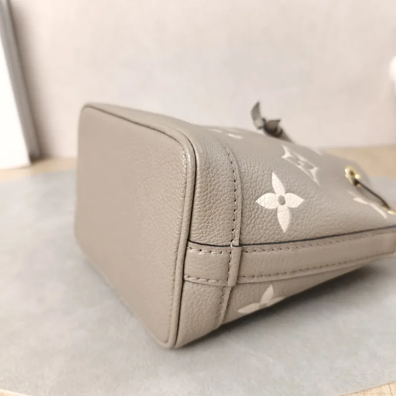 Louis Vuitton Crossbody Bag NANO NOÉ Bucket Bag Nano · White Empreinte Embossed Calfskin Monogramnano13 × 10 × 16 cm — detail view 6 of 15