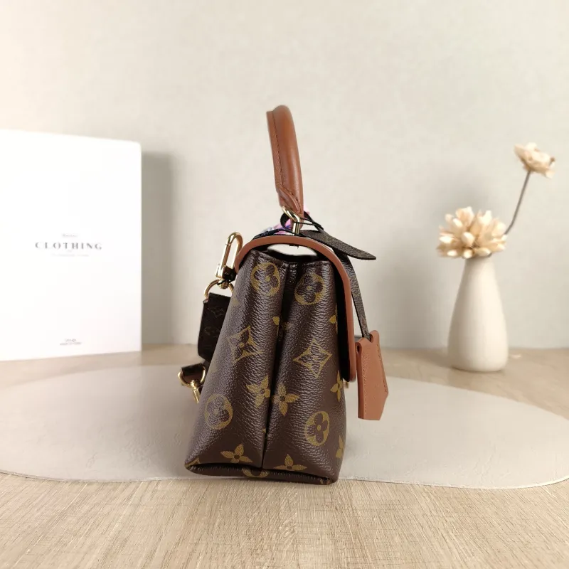Louis Vuitton Crossbody Bag MADELEINE PVC · Calfskin BB 24.5 × 8 × 16 cm — detail view 8 of 11