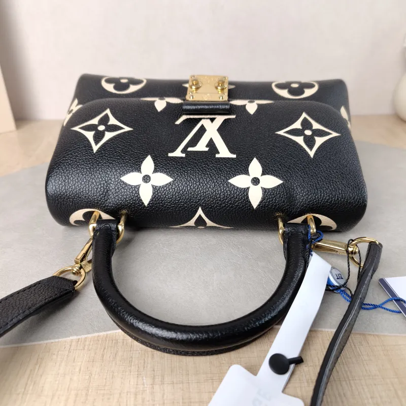 Louis Vuitton Crossbody Bag MADELEINE Black · White Monogram Empreinte Embossed Calfskin BB 24 × 8.5 × 17 cm — detail view 13 of 13