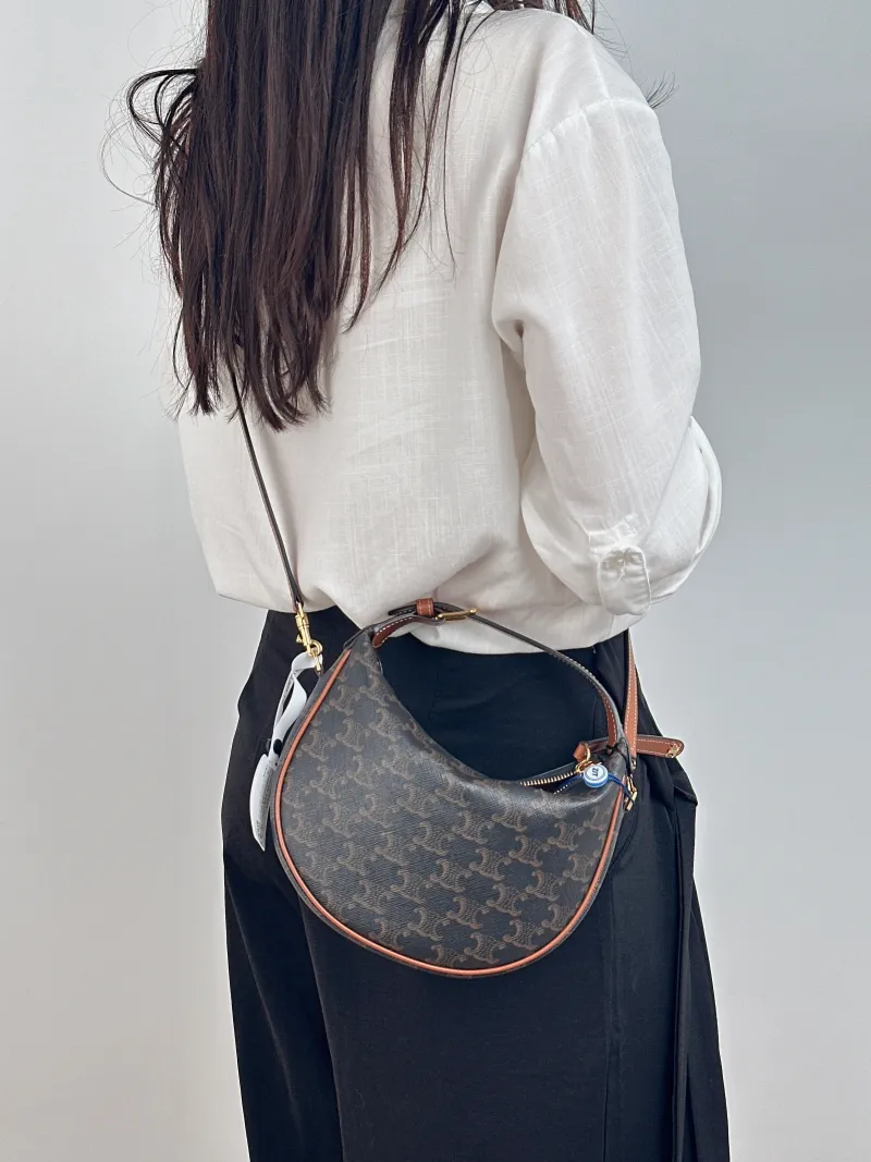 CELINE Crossbody Bag TEEN LULU hobo Monogram PVC 21 × 5 × 18 cm — on-model view 2 of 2