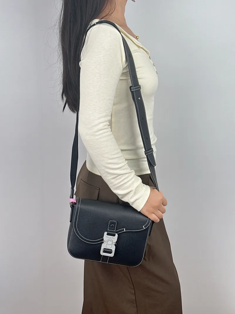 DIOR Crossbody Bag Black Calfskin Small 23 × 6 × 17.5 cm — on-model view 1 of 2