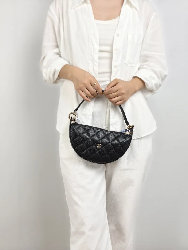 Chanel Crossbody Bag Top Handle Crossbody Bag Black Grained Calfskin 22 × 5.5 × 12 cm — on-model view 2 of 2