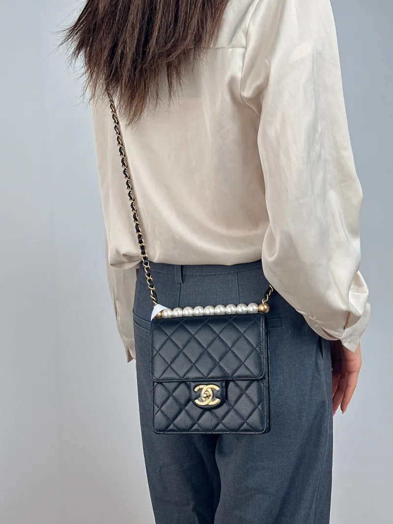 Chanel Crossbody Bag Pearl Crossbody Bag Black Calfskin One Size 15.5 × 5 × 15.5 cm 29 — on-model view 2 of 2