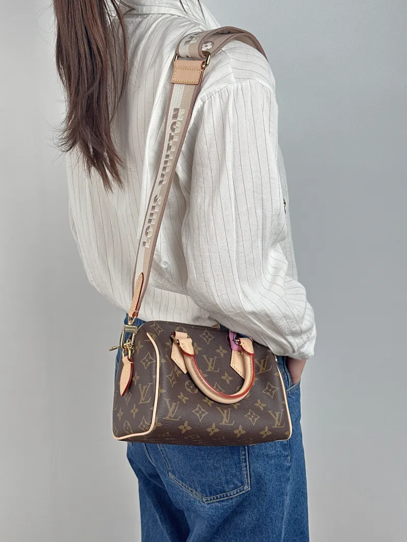 Louis Vuitton Crossbody Bag Speedy20 Shoulder Strap PVC Small 20.5 × 12 × 13.5 cm — on-model view 1 of 3