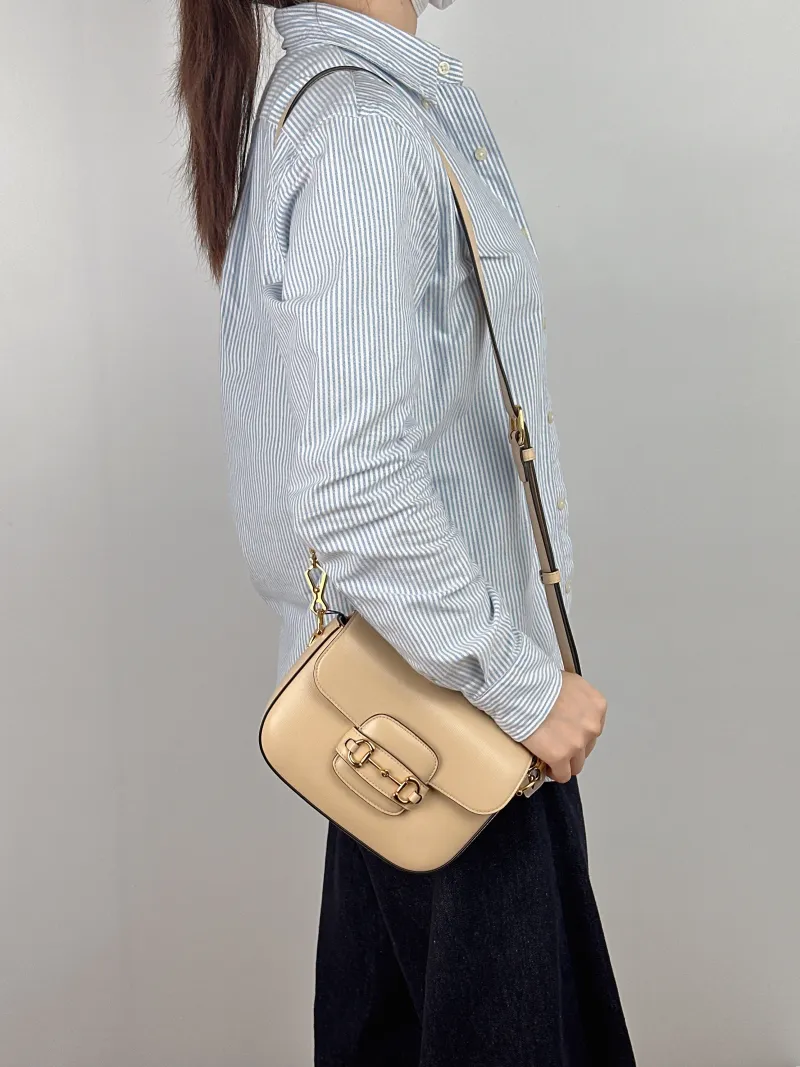 GUCCI Crossbody Bag Horsebit 1955 Horsebit Small Beige Calfskin Small 20.5 × 5 × 14.5 cm — on-model view 2 of 2