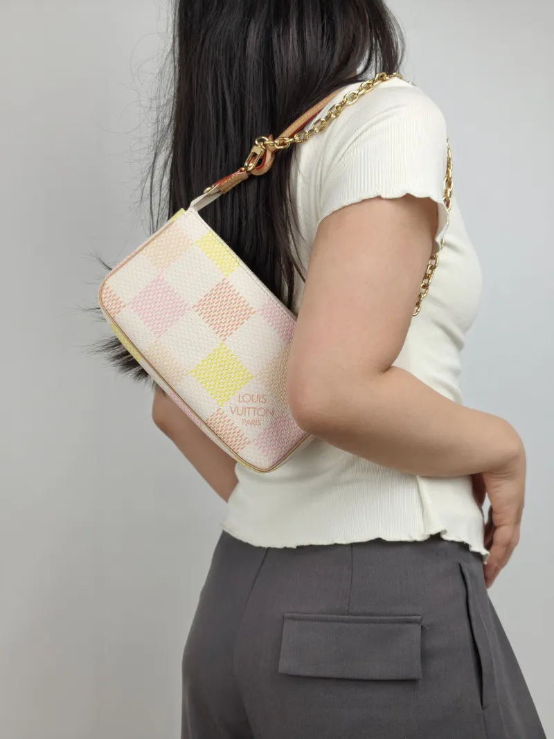 Louis Vuitton Shoulder Bag Pochette Accessoires PVC Large 23.5 × 4 × 13.5 cm — on-model view 2 of 2