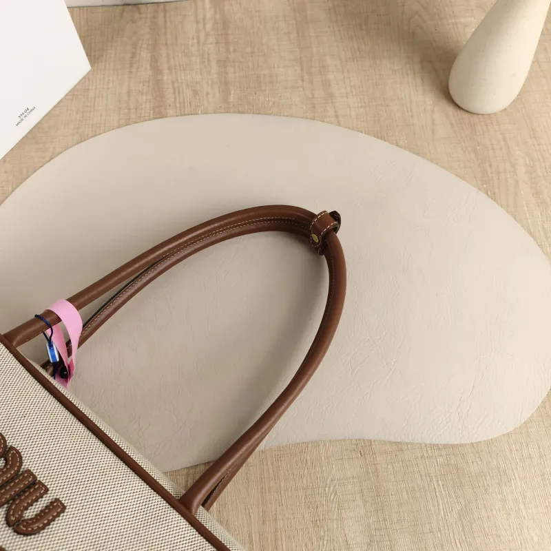 Miumiu Top Handle Bag Beau Brown Canvas · Calfskin Large34 × 10 × 20 cm — detail view 3 of 13