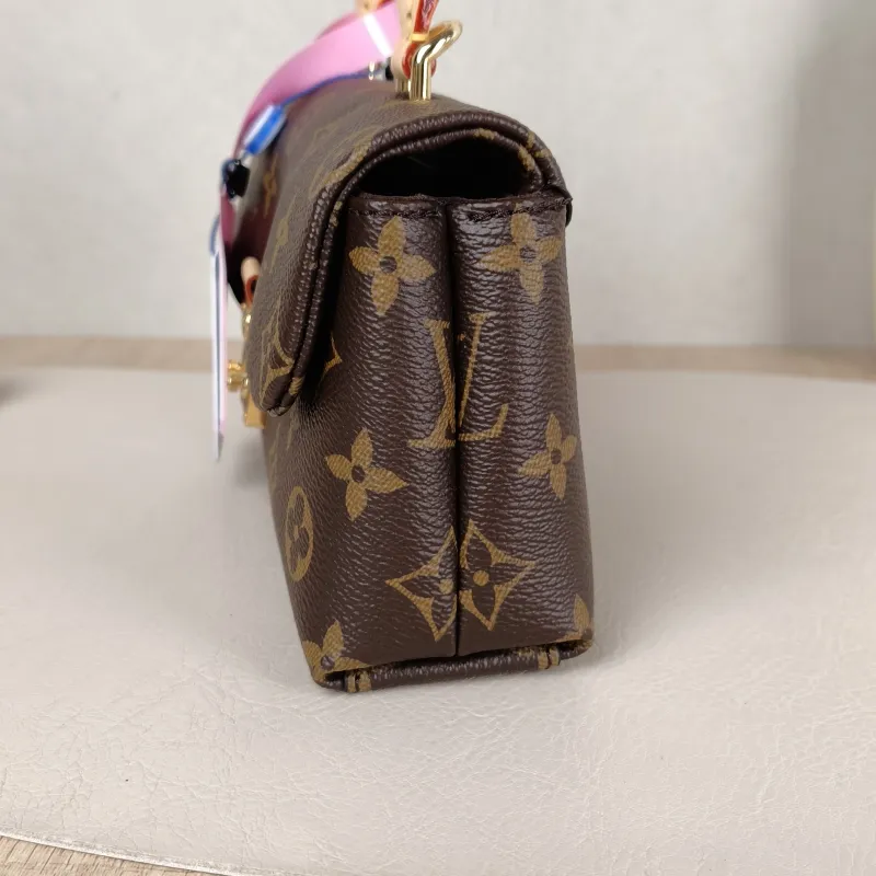 Louis Vuitton Crossbody Bag MADELEINE Monogram PVC nano 21 × 6 × 12.5 cm — detail view 9 of 12