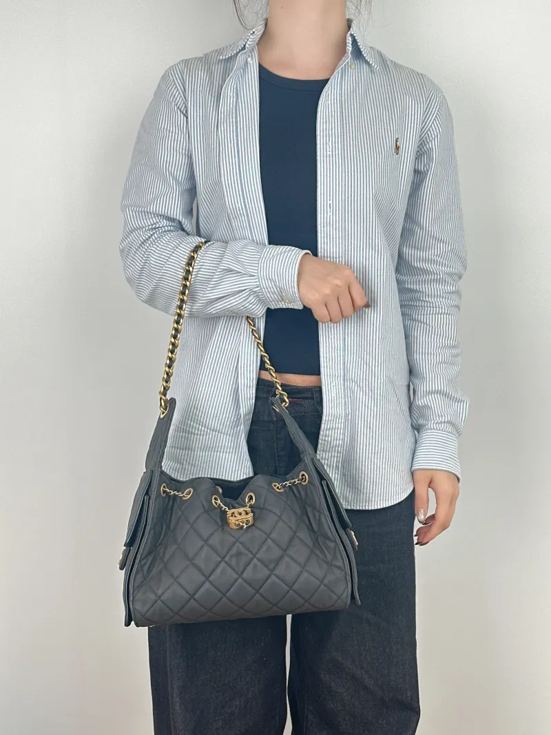 Chanel Shoulder Bag 25Bag Grey Canvas Small 26 × 14 × 30 cm — on-model view 1 of 2